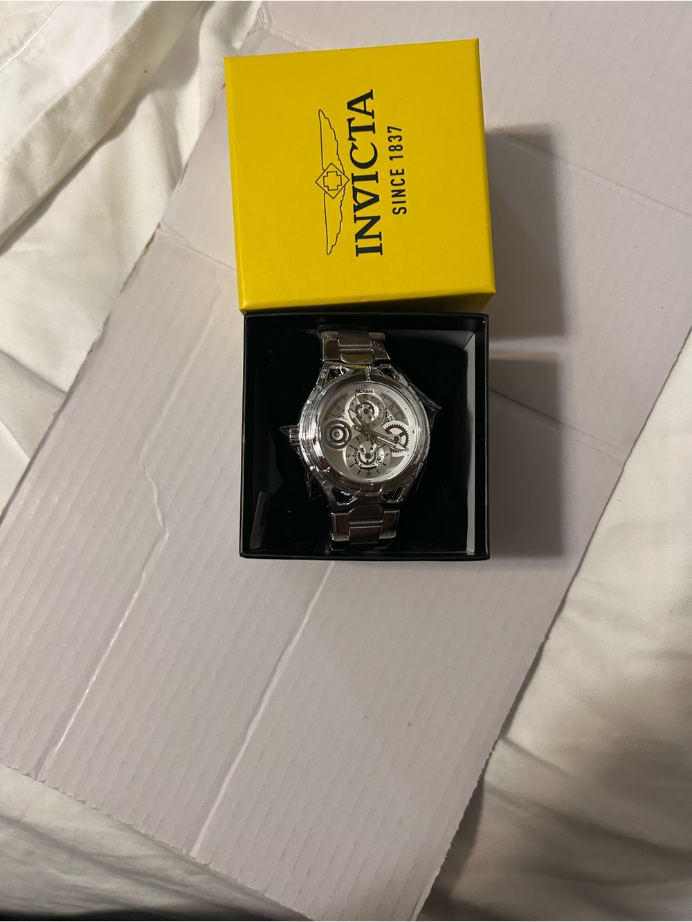 Invicta Silver Stainless Steel Skeleton Dial Watch with Yellow Box